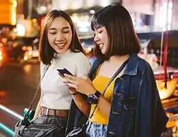 two young women enjoying downtown