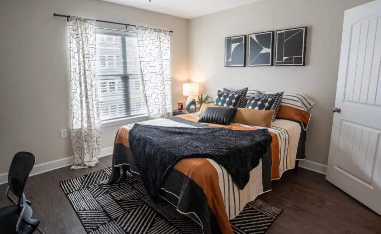 a fully-furnished apartment bedroom